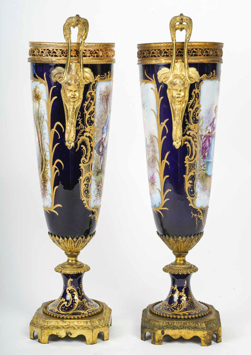 A pair of late 19th century sèvres blue porcelain vases