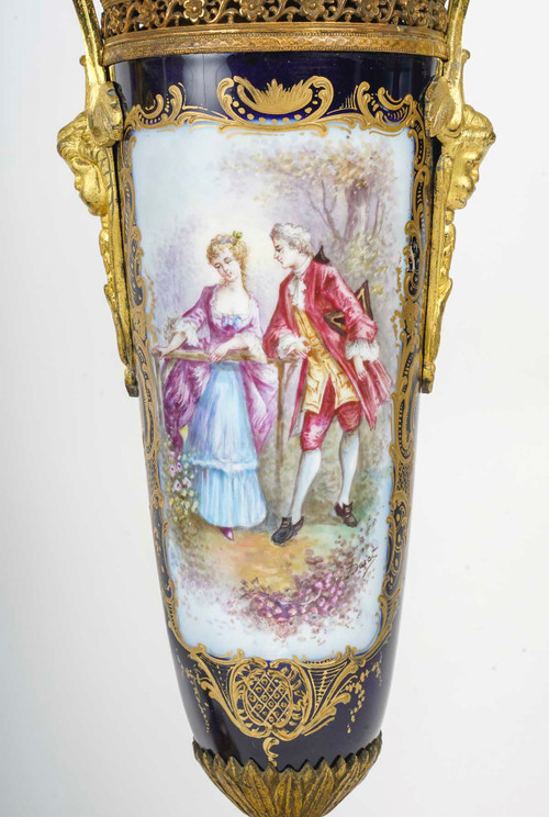 A pair of late 19th century sèvres blue porcelain vases