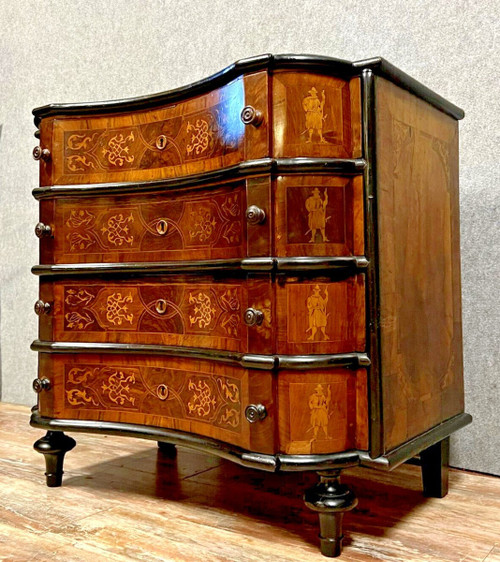 Baroque Louis XV period chest of drawers in blackened wood and marquetry circa 1750