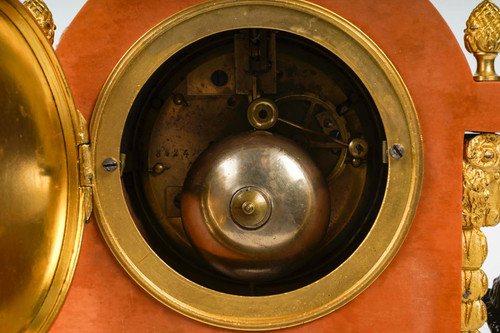 A pendulum in gilded bronze and pink marble late 19th century