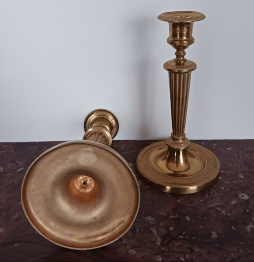 Paris, late 18th century - pair of small gilded bronze candlesticks or torches - late Louis XVI period