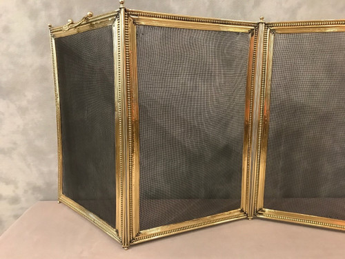 Antique Louis XVI style brass fireplace surround