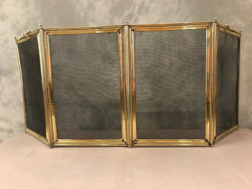 Antique Louis XVI style brass fireplace surround