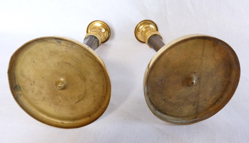 Pair of Empire gilt and patinated bronze candlesticks by Ravrio, early 19th century