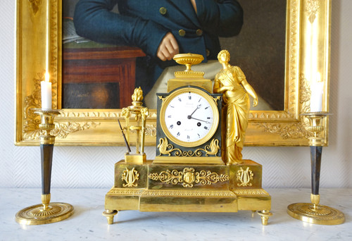 Pair of Empire gilt and patinated bronze candlesticks by Ravrio, early 19th century