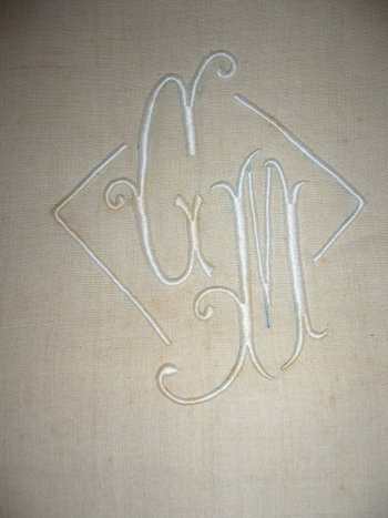 Old embroidered sheet in monogrammed linen