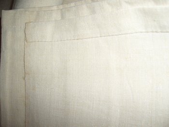 Old embroidered sheet in monogrammed linen