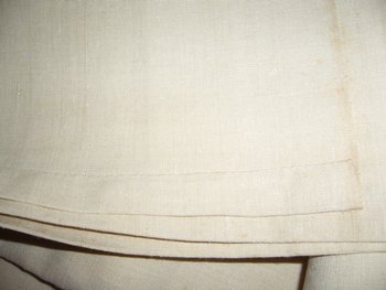 Old embroidered sheet in monogrammed linen