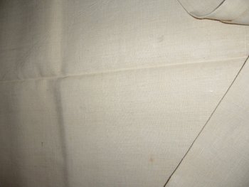 Old embroidered sheet in monogrammed linen