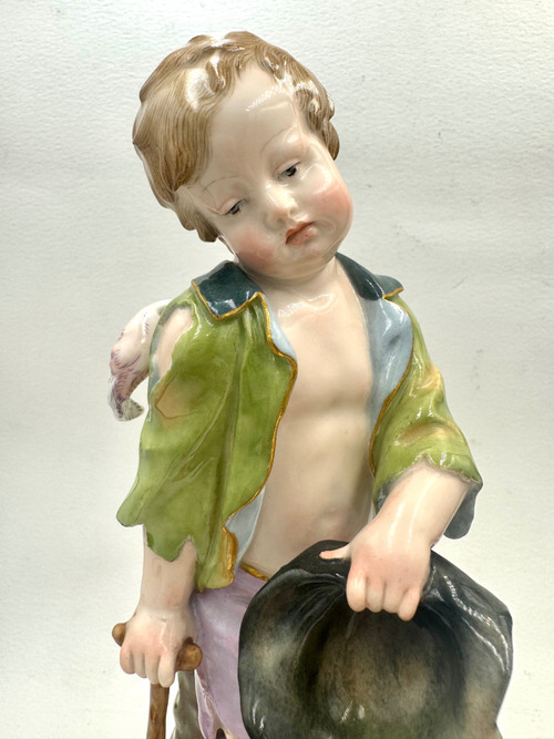 Meissen, figure en porcelaine Cupidon en mendiant 