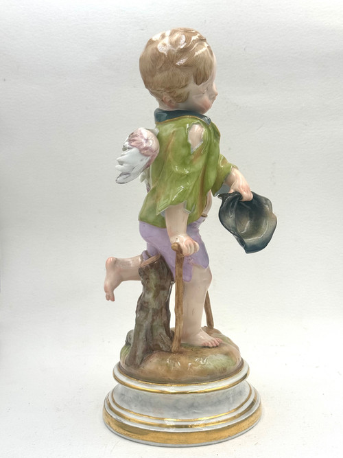 Meissen, figure en porcelaine Cupidon en mendiant 