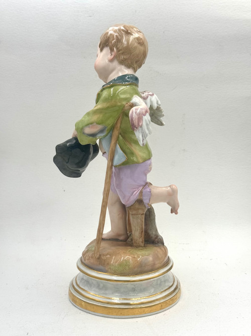 Meissen, figure en porcelaine Cupidon en mendiant 