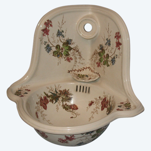 Corner hand wash basin in Sarreguemines earthenware with Carmen floral decoration, late 19th century