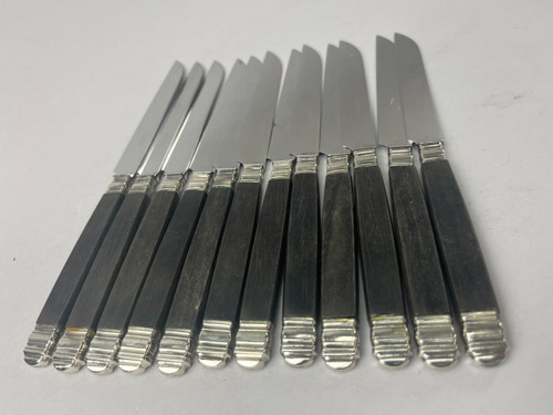 Twelve empire model table knives