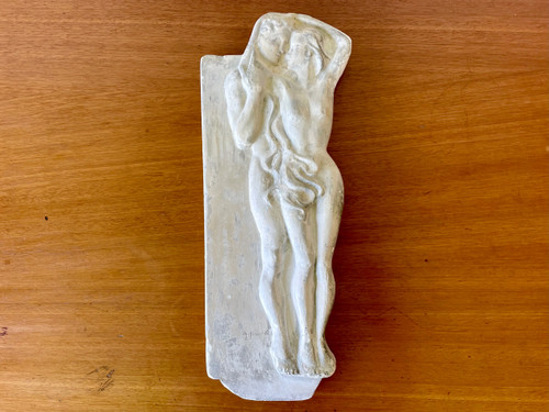 Plaster bas-relief representing Adam and Eve.