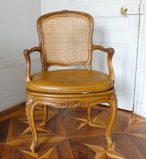 François Reuze: caned office armchair from the Louis XV period, stamped