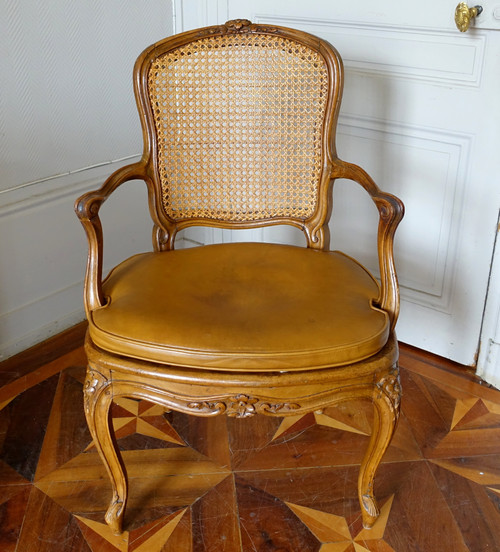 François Reuze: caned office armchair from the Louis XV period, stamped