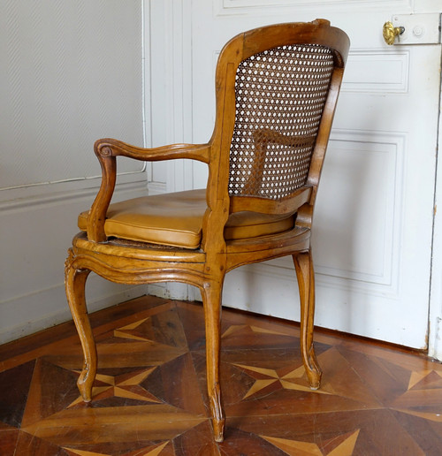 François Reuze: caned office armchair from the Louis XV period, stamped