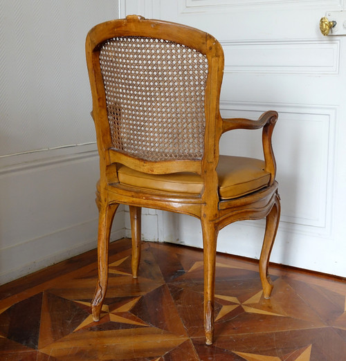 François Reuze: caned office armchair from the Louis XV period, stamped