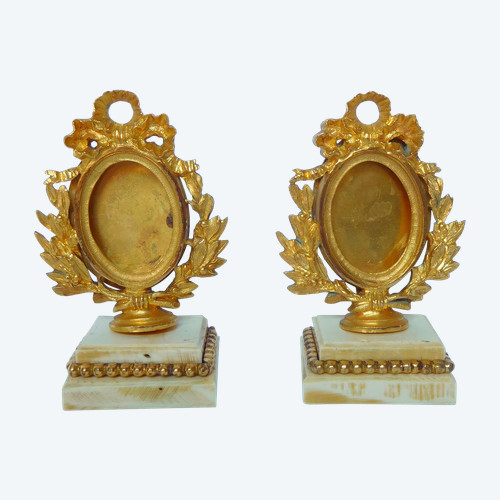 Pair of frames for miniature or photo in gilded bronze and ivory, Louis XVI style