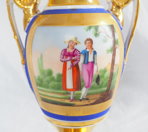 Pair of Empire period vases in Paris porcelain and biscuit, blue and gold polychrome decoration