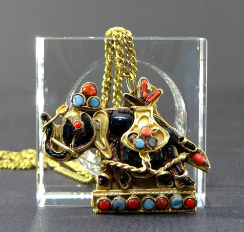 Tibet, Mid-Twentieth Century, Gilded Brass Pendant Embellished with a Representation of an Elephant.