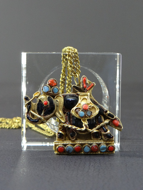 Tibet, Mid-Twentieth Century, Gilded Brass Pendant Embellished with a Representation of an Elephant.