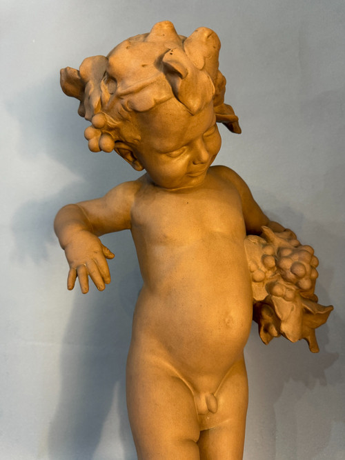 Sculpture Terre cuite de SEVRES "Bacchus enfant" signé MALRIC 