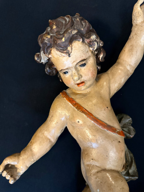 Paire de putti en bois sculpté et peint du XVIIIème (Anges, cupidons)