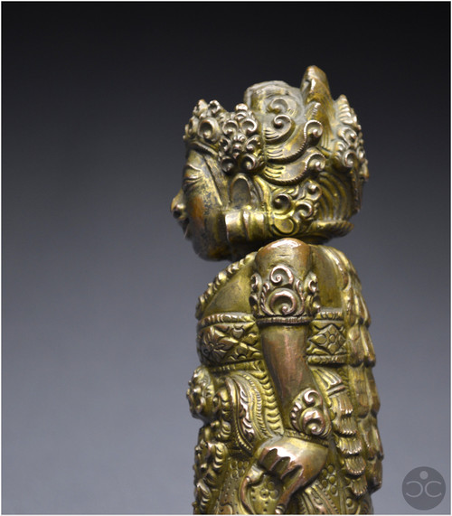 Indonesia, Bali, 16th - 17th century, Anthropomorphic kriss handle in copper alloy