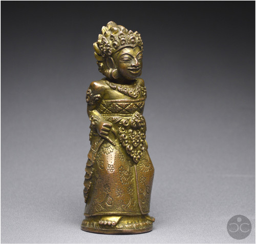 Indonesia, Bali, 16th - 17th century, Anthropomorphic kriss handle in copper alloy