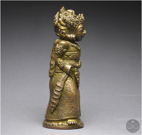 Indonesia, Bali, 16th - 17th century, Anthropomorphic kriss handle in copper alloy