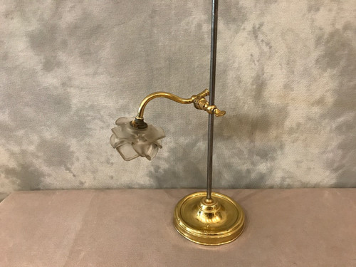 antique iron and polished brass lamp from the 19th century