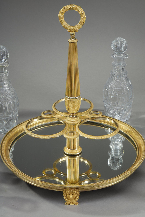 CHARLES X PERIOD LIQUOR SERVICE IN GILT BRONZE AND CUT CRYSTAL