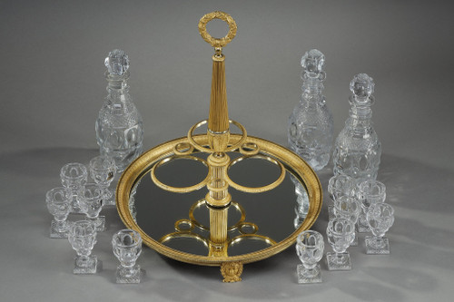 CHARLES X PERIOD LIQUOR SERVICE IN GILT BRONZE AND CUT CRYSTAL