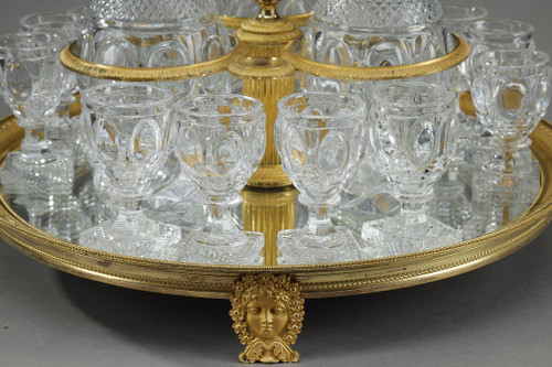 CHARLES X PERIOD LIQUOR SERVICE IN GILT BRONZE AND CUT CRYSTAL