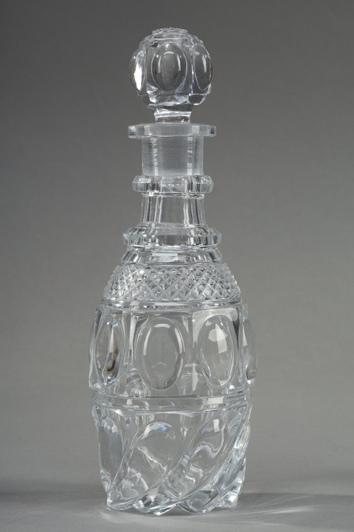 CHARLES X PERIOD LIQUOR SERVICE IN GILT BRONZE AND CUT CRYSTAL