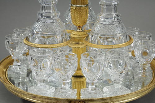 CHARLES X PERIOD LIQUOR SERVICE IN GILT BRONZE AND CUT CRYSTAL