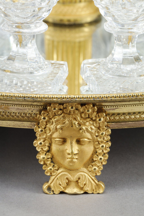 CHARLES X PERIOD LIQUOR SERVICE IN GILT BRONZE AND CUT CRYSTAL