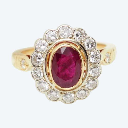 Surrounding ring in yellow gold, rubies and diamonds