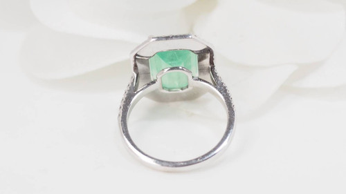 Double-encircled ring in white gold, certified Colombian emerald and diamonds