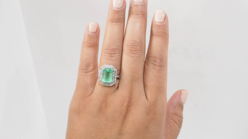 Double-encircled ring in white gold, certified Colombian emerald and diamonds