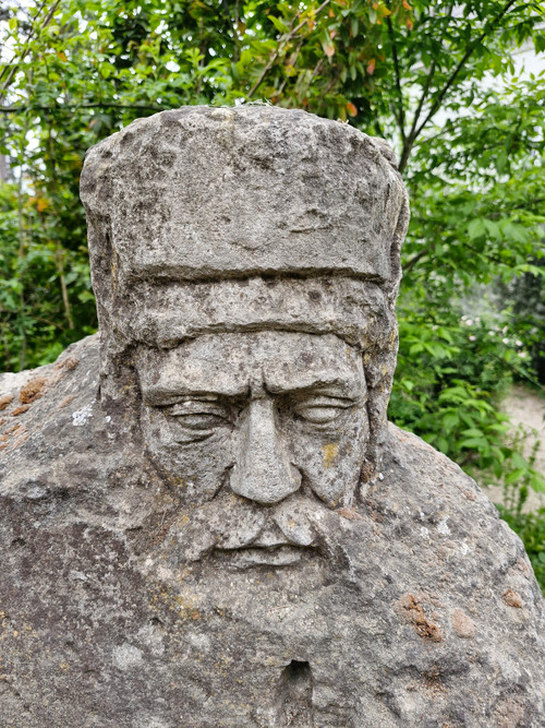 Stone bust of a man