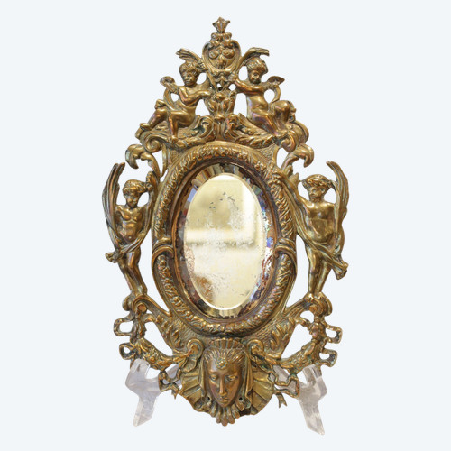 Miroir en bronze à décor d'angelots et mascarons fin 19ème siècle