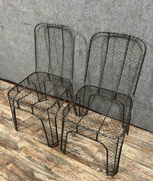 pair of industrial design chairs in wrought iron circa 1980