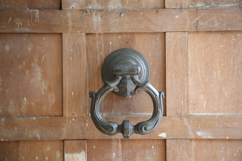 Large patinated bronze door knocker, late 17th century