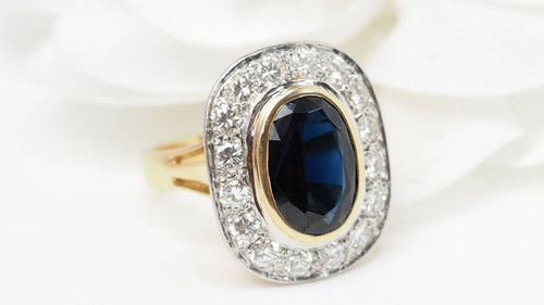 Two-tone gold, sapphire and diamond pompadour ring