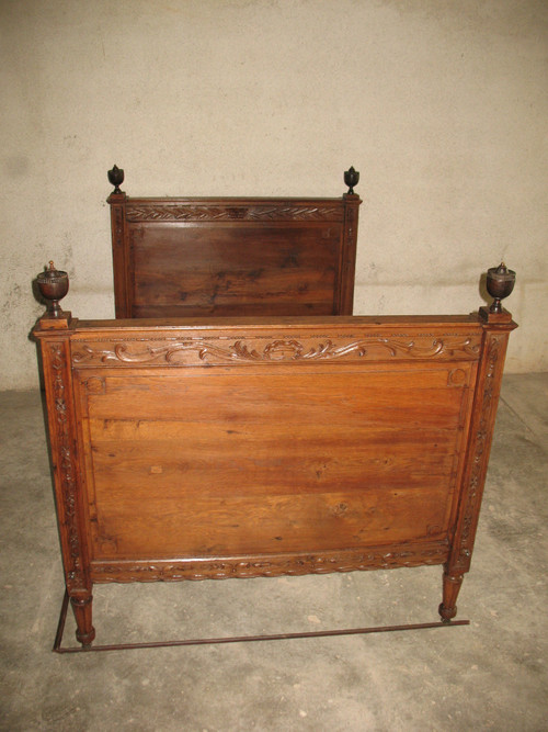 Late 18th century carved oak alcove bed complete with rails and casters