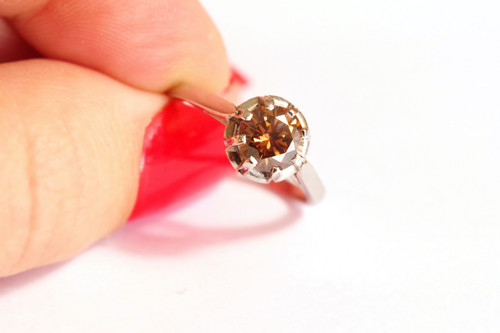 Fancy brown diamond ring in platinum, fancy deep brown diamond