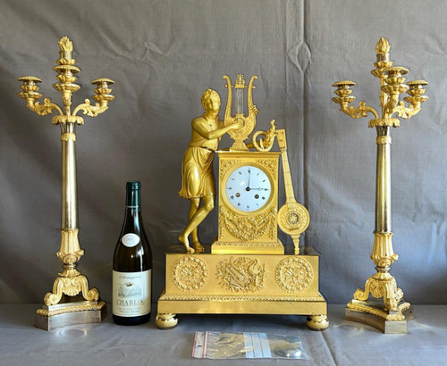 Garniture de cheminée en bronze doré Epoque Charles X.